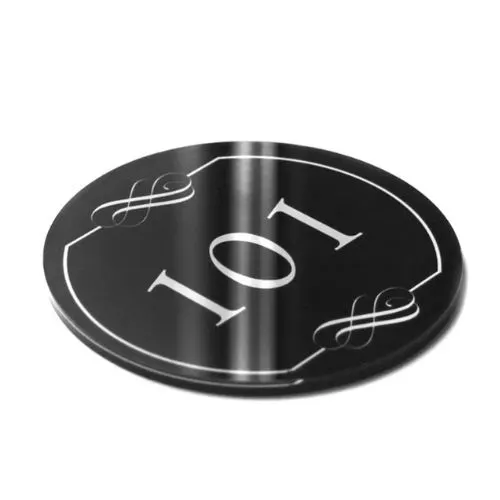Round black acrylic room number sign with engraved details